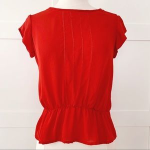 Joie Phaedra Peplum Silk Blouse in Poppy Red
